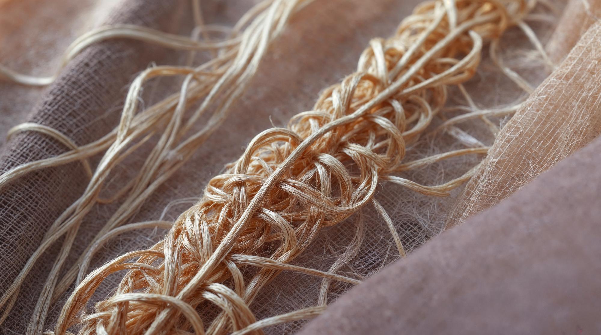 Close detail of floral stitch on linen